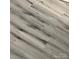 Close up on the light gray wood grain flooring throughout the home at 1111 Pondella Dr # 66, Charlotte, NC 28213