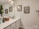 Chic bathroom featuring a double vanity, modern fixtures, and elegant decor at 125 Lanyard Dr # E, Mooresville, NC 28117