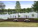 Scenic lake view with picnic tables, great for outdoor dining at 125 Lanyard Dr # E, Mooresville, NC 28117