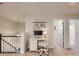 Bright home office nook with a white desk, chair, and neutral decor on the upper landing at 125 Lanyard Dr # E, Mooresville, NC 28117