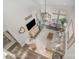 Open-concept living room with high ceilings, modern decor, and comfortable seating with natural light at 125 Lanyard Dr # E, Mooresville, NC 28117
