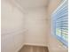 Spacious walk-in closet with shelving, offering ample storage and organization options at 125 Lanyard Dr # E, Mooresville, NC 28117
