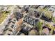 Aerial view of a residential neighborhood featuring townhouses and tree-lined streets at 1525 Walnut View Dr, Charlotte, NC 28208