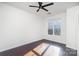 Simple bedroom with hardwood flooring, ready to be furnished and styled at 1525 Walnut View Dr, Charlotte, NC 28208