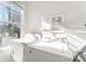 Bright laundry room featuring a washer, a dryer, and a window for natural light at 1525 Walnut View Dr, Charlotte, NC 28208