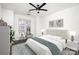 Serene main bedroom with bright window, comfortable furnishings, and stylish decor at 1525 Walnut View Dr, Charlotte, NC 28208