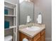 Bathroom featuring a wood vanity, updated fixtures, and a large mirror at 163 Brookshire Dr, Fort Mill, SC 29715
