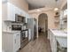 Modern kitchen boasting stainless steel appliances, white cabinetry, and open layout with backyard views at 163 Brookshire Dr, Fort Mill, SC 29715