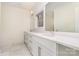 Bathroom featuring a double vanity, bright lighting, and a large, well-lit mirror at 1665 Sterling Rd, Charlotte, NC 28209
