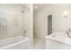 Bathroom featuring decorative tile, a single vanity, bathtub, and a shower combo at 1665 Sterling Rd, Charlotte, NC 28209