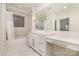 Bright bathroom with a tub-shower combo, mosaic tile wall, and a large vanity at 1665 Sterling Rd, Charlotte, NC 28209