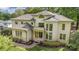 Stunning two-story home with landscaped front yard, elegant architectural details, and a welcoming entrance at 1665 Sterling Rd, Charlotte, NC 28209