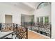 View of the home's foyer showcasing high ceilings, hardwood floors, and decorative wrought iron railing at 1665 Sterling Rd, Charlotte, NC 28209