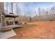 Large backyard with a gazebo, play set, and space for outdoor activities at 1795 Kestrel Valley Ln, Catawba, NC 28609