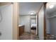 Bright bathroom featuring a shower, vanity with a sink, and wood-look flooring at 1795 Kestrel Valley Ln, Catawba, NC 28609