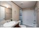 Bathroom with a combination shower and tub, white toilet, and vanity with sink at 1795 Kestrel Valley Ln, Catawba, NC 28609