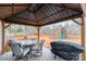 Gazebo featuring a dining set and grill, perfect for outdoor entertaining and barbecues at 1795 Kestrel Valley Ln, Catawba, NC 28609