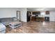 Open-concept living area flowing into a modern kitchen, great for entertaining at 1795 Kestrel Valley Ln, Catawba, NC 28609