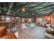 Spacious living room features a bar, hardwood floors, and unique ceiling beams at 190 Country Dr, Statesville, NC 28625