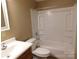 Cozy bathroom features a tub-shower combo, a modern vanity, and neutral wall color at 1909 E Lawyers Rd, Monroe, NC 28110