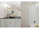 Elegant bathroom featuring chandelier lighting and a shower at 2445 Selwyn Ave, Charlotte, NC 28209