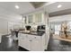 Open dining area with modern white cabinets and easy access to kitchen and living spaces at 2445 Selwyn Ave, Charlotte, NC 28209