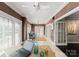 Well-lit office space with white blinds, brown walls, and a desk perfect for productivity and comfort at 2445 Selwyn Ave, Charlotte, NC 28209