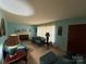 Bright living room with a fireplace and traditional decor at 2730 Medlin Rd, Monroe, NC 28112