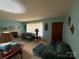 Bright living room with a fireplace and traditional decor at 2730 Medlin Rd, Monroe, NC 28112