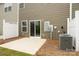 Cozy back patio with sliding door access, perfect for outdoor relaxation and entertaining at 2749 Yeager Nw Dr, Concord, NC 28027