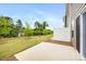 Large back patio, ideal for entertaining or relaxing, with a view of the landscaped backyard at 2749 Yeager Nw Dr, Concord, NC 28027