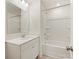 Clean bathroom with white vanity, sink, and shower-tub combo at 2749 Yeager Nw Dr, Concord, NC 28027