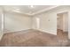 Large bedroom with carpet, tray ceiling, and recessed lighting at 2749 Yeager Nw Dr, Concord, NC 28027