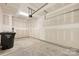 Bright garage with an automatic door opener at 2749 Yeager Nw Dr, Concord, NC 28027