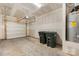 Bright garage with an automatic door opener and water heater at 2749 Yeager Nw Dr, Concord, NC 28027