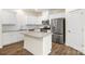 Well-equipped kitchen with stainless steel appliances and a functional center island at 2749 Yeager Nw Dr, Concord, NC 28027