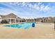 Community pool featuring crystal clear water, a spacious pool deck, and neighborhood clubhouse at 2749 Yeager Nw Dr, Concord, NC 28027