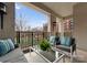 Enjoy the outdoors with a private balcony featuring cozy seating and a scenic courtyard view at 300 W 5Th St # 224, Charlotte, NC 28202
