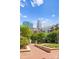 Lush courtyard with fountain, putting green, and city views providing a serene urban oasis at 300 W 5Th St # 224, Charlotte, NC 28202