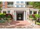 Elegant entrance to this building, complete with well-manicured landscaping and architectural detail at 300 W 5Th St # 224, Charlotte, NC 28202
