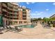 Relaxing community pool with lounge chairs and umbrellas for a resort-style experience at 300 W 5Th St # 224, Charlotte, NC 28202