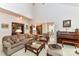 Comfortable living room showcasing an open floor plan to dining and kitchen areas at 306 Ashby Dr, Davidson, NC 28036
