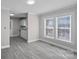 The kitchen features new cabinets and flooring at 310 Pineview St, Kannapolis, NC 28083
