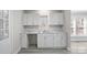 Kitchen showcasing white cabinets, a marble countertop, and stainless steel appliances at 310 Pineview St, Kannapolis, NC 28083