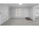 Spacious living room boasting ample natural light and a classic fireplace at 310 Pineview St, Kannapolis, NC 28083