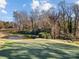 Scenic aerial view of the golf course and wooded surroundings at 32 Fairway Rdg, Lake Wylie, SC 29710