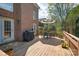 Enjoy outdoor living on this spacious back deck with an umbrella and dining set at 3304 Taviston Dr, Waxhaw, NC 28173