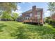 Spacious backyard with a wooden deck perfect for outdoor gatherings and Gathering fun at 3304 Taviston Dr, Waxhaw, NC 28173