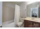 Neutral bathroom with a tub, tile surround, shower and a vanity with a single sink at 3304 Taviston Dr, Waxhaw, NC 28173