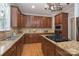 Gourmet kitchen with stainless steel appliances, granite countertops and custom cabinetry at 3304 Taviston Dr, Waxhaw, NC 28173